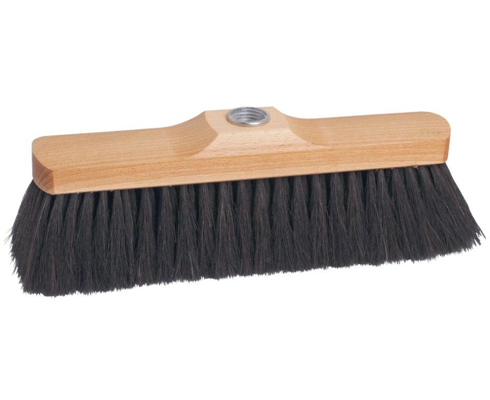 A wall-mounted brush with a light natural wood handle and dense black bristles, shown against a plain white background.